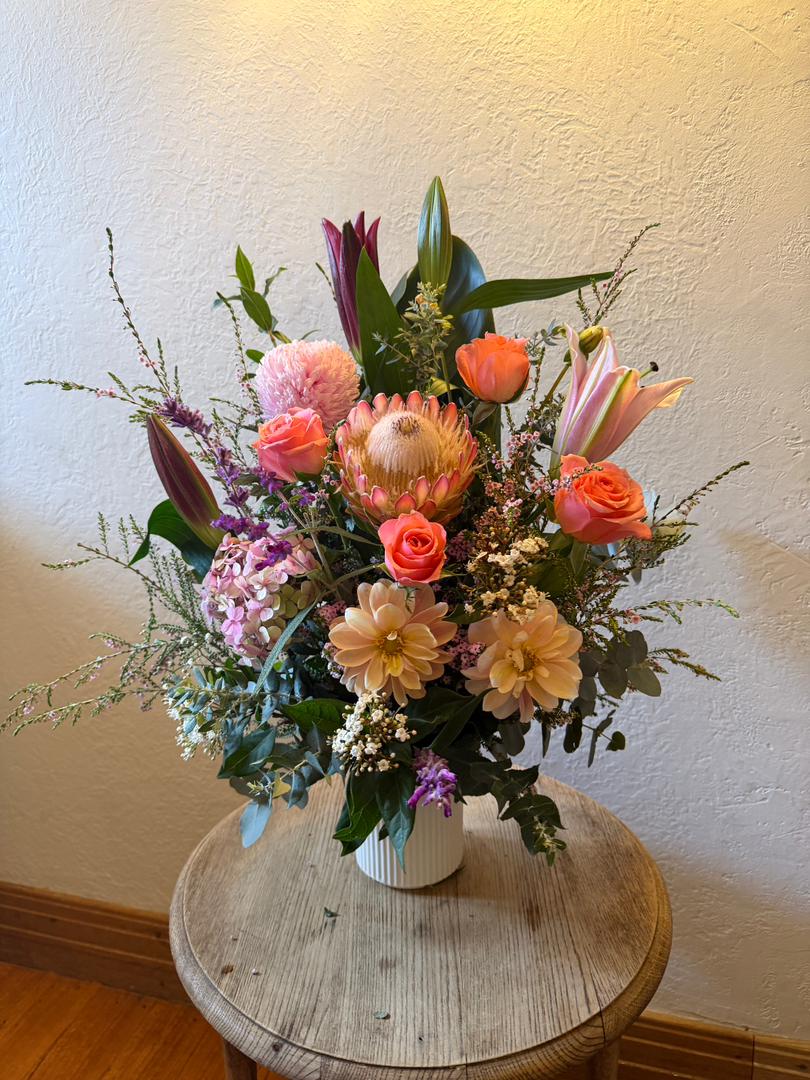 pastel mixed flower arrangement in ceramic vase pastel mixed flower arrangement in ceramic vase