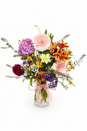 minimal seasonal flowers in glass vase